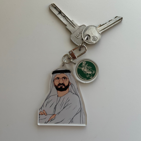 A stylish and durable keychain made of acrylic, perfect for keys, bags, and accessories.