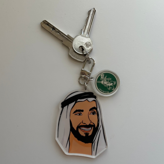 A stylish and durable keychain made of acrylic, perfect for keys, bags, and accessories.