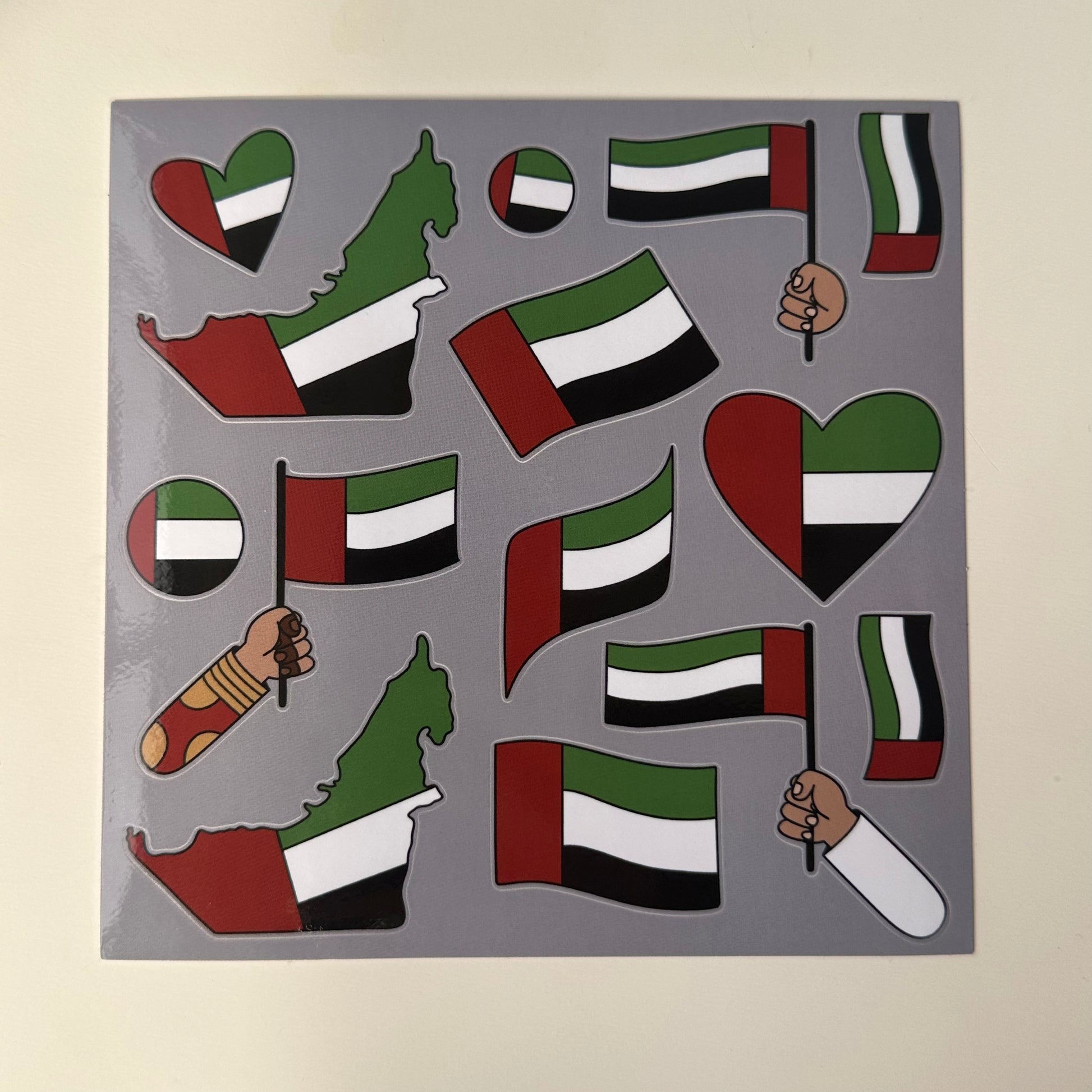 A waterproof vinyl sticker sheet featuring 14 unique, durable, and vibrant stickers, perfect for decorating laptops, phones, water bottles, and more.